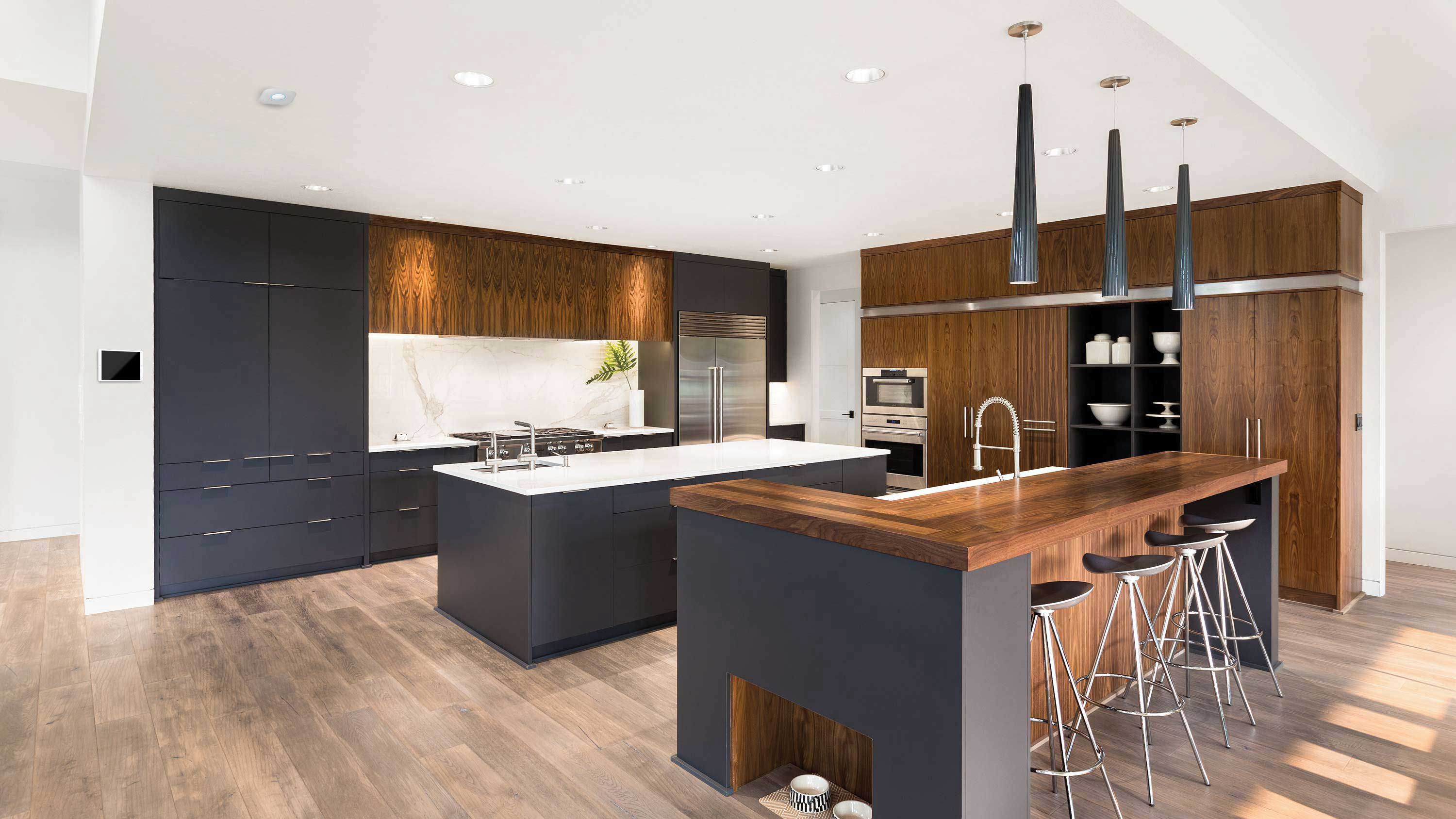 modern kitchen with white, navy blue, and wooden accents